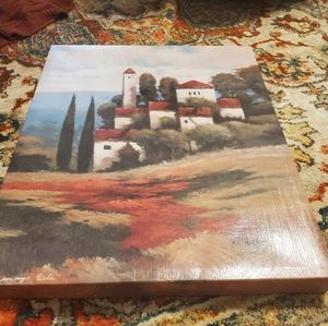 Red roof building canvas picture.